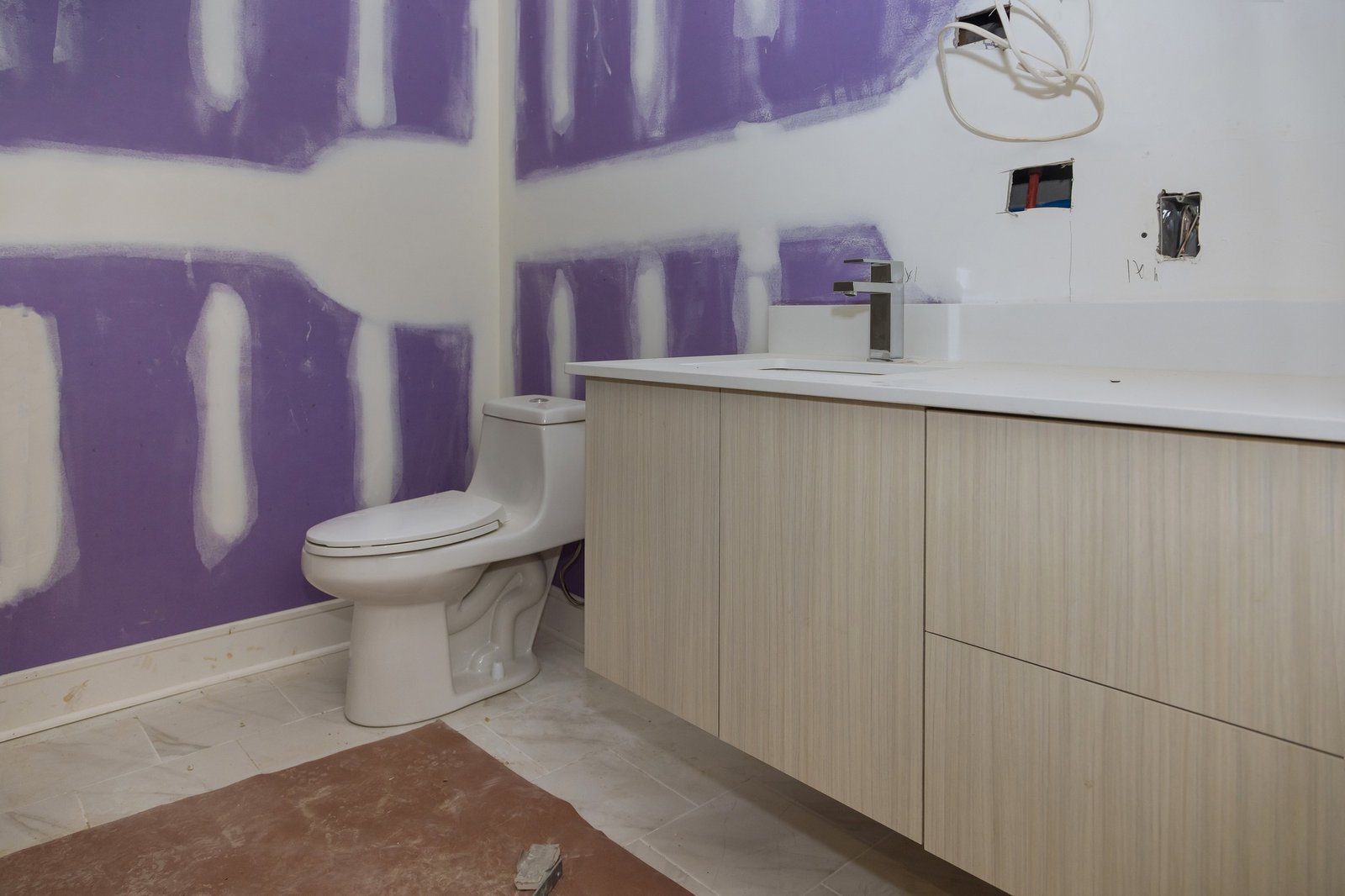 Master Bathroom with new under construction bathroom interior drywall ready for tile